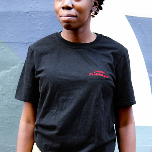 "People Not Punishment" Embroidered Tee Shirt
